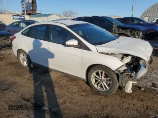 2016 Ford Focus SE with VIN 1FADP3F29GL404551, listed as a Copart auction lot 51205255 with 110,778 mi miles and Salvage Title. Bid and sale history available at DreamBid. Image 4.