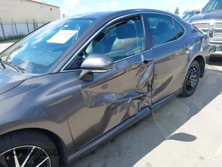 2022 Toyota Camry SE with VIN 4T1G11AK1NU499064, listed as a IAAI auction lot 41734310 with 87,159 mi miles and . Bid and sale history available at DreamBid. Image 6.
