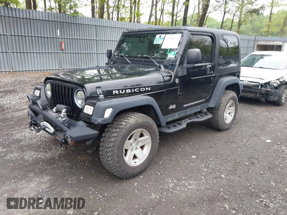 2006 Jeep Wrangler Rubicon z VIN 1J4FA69S76P749712, wystawiony jako IAAI lot #42240375 z przebiegiem 75 405 mil mil oraz . Historia ofert i sprzedaży dostępna na DreamBid. Obrazek 17.