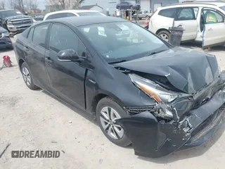 2017 Toyota Prius Two with VIN JTDKARFUXH3041931, listed as a IAAI auction lot 42075004 with 75,768 mi miles and . Bid and sale history available at carsss.com. Image 1.