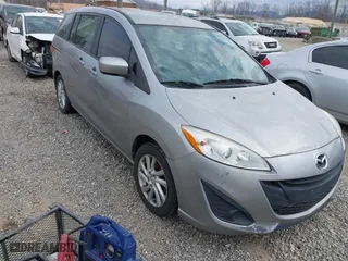 2012 Mazda Mazda5 Sport with VIN JM1CW2BL8C0100821, listed as a IAAI auction lot 41707330 with 180,574 mi miles. Bid and sale history available at carsss.com. Image 1.