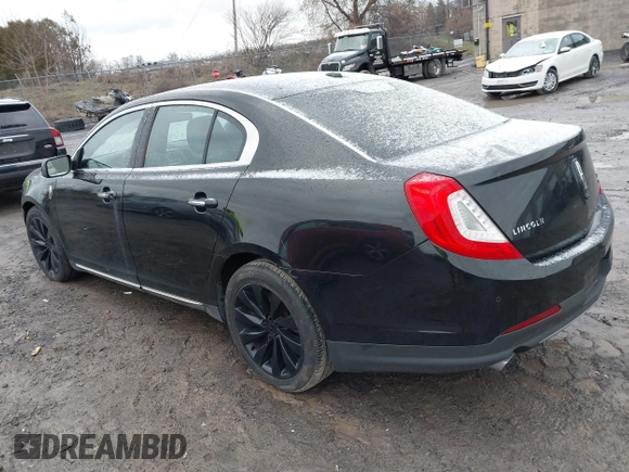 2014 Lincoln MKS with VIN 1LNHL9EK3EG601471, listed as a IAAI auction lot 41142126 with 110,432 mi miles. Bid and sale history available at carsss.com. Image 3.