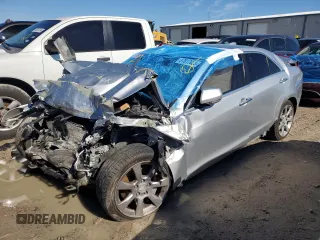 2015 Cadillac ATS Sedan Luxury RWD with VIN 1G6AB5RX1F0101197, listed as a Copart auction lot 87817035 with 0 mi miles and Salvage Title. Bid and sale history available at carsss.com. Image 1.