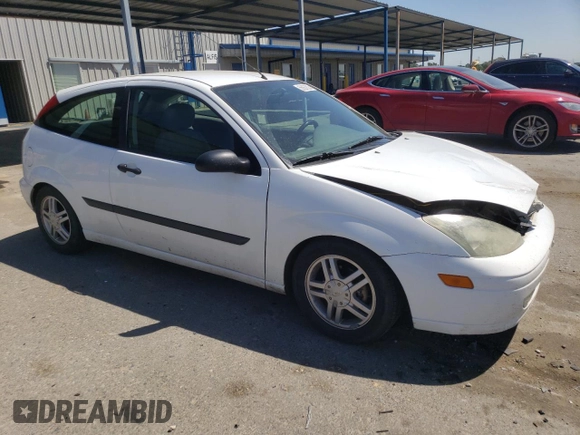 2003 Ford Focus ZX3 с VIN 3FAFP31303R120956, выставлен на аукционе Copart как лот 55867825 с пробегом 169 277 миль миль и Списание • Salvage title. История ставок и продаж доступна на DreamBid. Изображение 4.