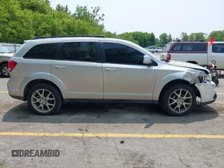 2012 Dodge Journey SXT with VIN 3C4PDDBG1CT249368, listed as a IAAI auction lot 42412217 with 151,680 mi miles and . Bid and sale history available at DreamBid. Image 14.
