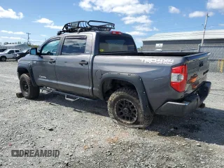 2014 Toyota Tundra 4WD Truck SR5 with VIN 5TFDY5F10EX400758, listed as a Copart auction lot 69950174 with 130,657 mi miles and Salvage Title. Bid and sale history available at carsss.com. Image 2.