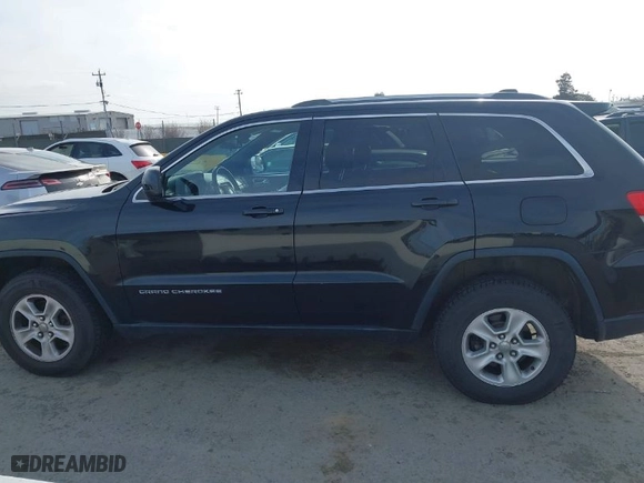 2014 Jeep Grand Cherokee Laredo with VIN 1C4RJFAG9EC516138, listed as a IAAI auction lot 42055214 with 135,701 mi miles. Bid and sale history available at carsss.com. Image 14.