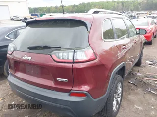 2019 Jeep Cherokee Latitude Plus with VIN 1C4PJLLB9KD434990, listed as a IAAI auction lot 41959477 with 96,283 mi miles and . Bid and sale history available at DreamBid. Image 4.