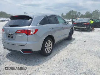 2018 Acura RDX with VIN 5J8TB3H33JL001314, listed as a IAAI auction lot 42320942 with 61,206 mi miles and . Bid and sale history available at DreamBid. Image 4.