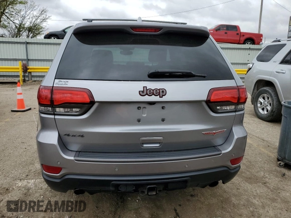 2018 Jeep Grand Cherokee Trailhawk with VIN 1C4RJFLG8JC164774, listed as a Copart auction lot 51699845 with 104,467 mi miles and Salvage title. Bid and sale history available at DreamBid. Image 6.