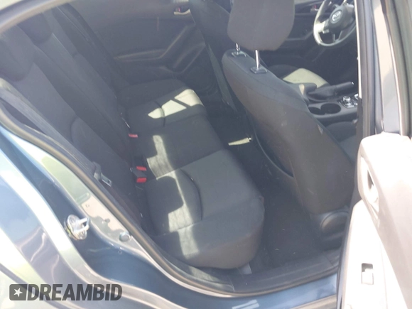 2016 Mazda 3 i Sport with VIN 3MZBM1T78GM285465, listed as a IAAI auction lot 42000874 with 71,272 mi miles and . Bid and sale history available at DreamBid. Image 8.