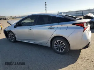 2020 Toyota Prius L Eco z VIN JTDKARFU1L3122471, wystawiony jako Copart lot #54164935 z przebiegiem 130 642 mil mil oraz Szkoda całkowita • Salvage title. Historia ofert i sprzedaży dostępna na DreamBid. Obrazek 2.
