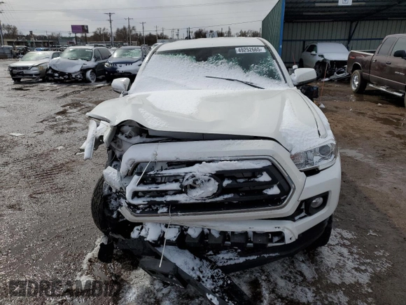 2021 Toyota Tacoma SR z VIN 3TYSZ5AN0MT009231, wystawiony jako Copart lot #49252665 z przebiegiem Nie podano mil oraz Szkoda całkowita • Salvage title. Historia ofert i sprzedaży dostępna na DreamBid. Obrazek 5.