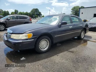 2000 Lincoln Town Car Executive с VIN 1LNHM81W2YY918401, выставлен на аукционе Copart как лот 63603005 с пробегом 167 504 миль миль и Списание • Salvage title. История ставок и продаж доступна на DreamBid. Изображение 1.