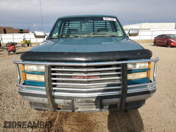 1994 GMC Sierra 1500 with VIN 1GTEK14K5RE539652, listed as a Copart auction lot 80877094 with 162,533 mi miles and Salvage Title. Bid and sale history available at DreamBid. Image 5.