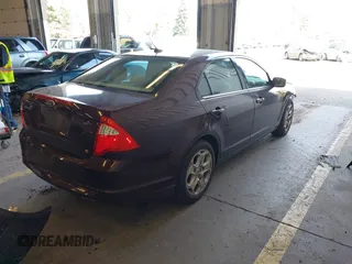 2011 Ford Fusion SE with VIN 3FAHP0HAXBR160083, listed as a IAAI auction lot 41964198 with 114,552 mi miles. Bid and sale history available at carsss.com. Image 4.