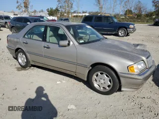 1998 Mercedes-Benz C 230/260/280/320 with VIN WDBHA23G8WA620777, listed as a Copart auction lot 77751154 with 144,032 mi miles and Salvage Title. Bid and sale history available at carsss.com. Image 4.
