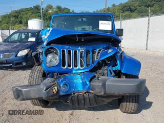 2016 Jeep Wrangler Sahara with VIN 1C4AJWBG9GL112139, listed as a IAAI auction lot 40286816 with 54,568 mi miles and . Bid and sale history available at DreamBid. Image 12.