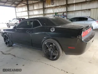 2010 Dodge Challenger SE with VIN 2B3CJ4DV6AH172734, listed as a Copart auction lot 53347455 with 93,119 mi miles and Salvage Title. Bid and sale history available at carsss.com. Image 2.
