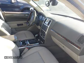2009 Chrysler 300 Limited with VIN 2C3KA33V99H592963, listed as a IAAI auction lot 42041417 with 160,829 mi miles. Bid and sale history available at carsss.com. Image 5.