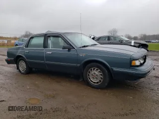 1996 Oldsmobile Cutlass Ciera 1SA VX5 z VIN 1G3AJ55M2T6382818, wystawiony jako Copart lot #80290114 z przebiegiem 137 463 mil mil oraz Szkody całkowita. Historia ofert i sprzedaży dostępna na DreamBid. Obrazek 4.