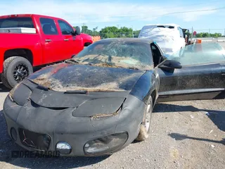 2001 Pontiac Firebird Formula z VIN 2G2FV22G512149316, wystawiony jako IAAI lot #42322668 z przebiegiem 109 585 mil mil oraz . Historia ofert i sprzedaży dostępna na DreamBid. Obrazek 6.