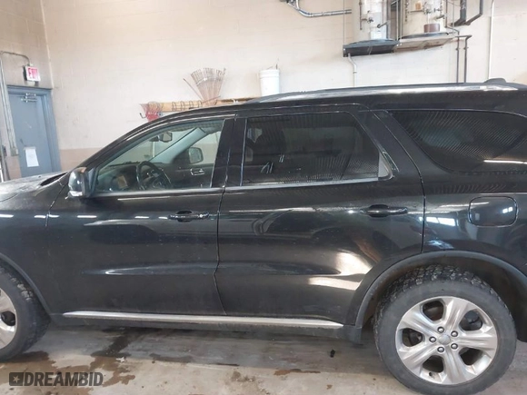 2014 Dodge Durango Limited with VIN 1C4RDJDG1EC973130, listed as a IAAI auction lot 41846596 with 166,182 mi miles. Bid and sale history available at carsss.com. Image 14.