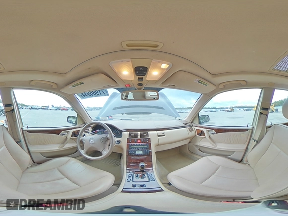 2001 Mercedes-Benz E-Class AWD with VIN WDBJF82J91X060969, listed as a Copart auction lot 71986544 with 113,694 mi miles and Salvage Title. Bid and sale history available at carsss.com. Image 12.