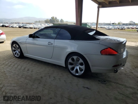 2006 BMW 6 Series 650Ci z VIN WBAEK134X6CN77921, wystawiony jako Copart lot #54093355 z przebiegiem 162 363 mil mil oraz Czysty tytuł • Clean title. Historia ofert i sprzedaży dostępna na DreamBid. Obrazek 2.
