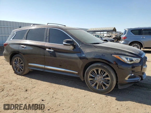 2019 Infiniti QX60 Pure with VIN 5N1DL0MN9KC566394, listed as a Copart auction lot 62879095 with 56,448 mi miles and Salvage title. Bid and sale history available at DreamBid. Image 4.