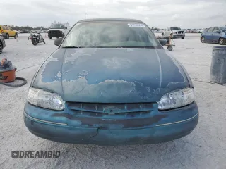 1997 Chevrolet Lumina LS with VIN 2G1WL52M1V9120300, listed as a Copart auction lot 87460394 with 142,588 mi miles and Salvage Title. Bid and sale history available at DreamBid. Image 5.