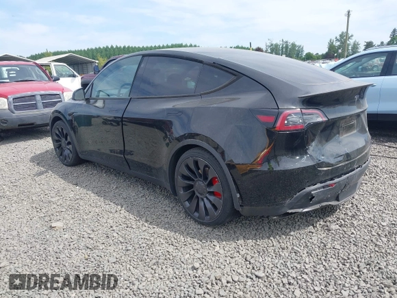 2022 Tesla Model Y Performance z VIN 7SAYGDEF5NF546680, wystawiony jako IAAI lot #42229359 z przebiegiem 55 597 mil mil oraz . Historia ofert i sprzedaży dostępna na DreamBid. Obrazek 3.