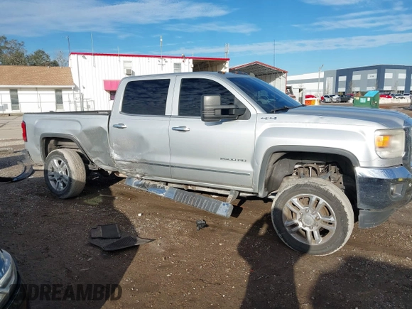 2015 GMC Sierra 2500HD available WiFi SLT with VIN 1GT12ZEG7FF167096, listed as a IAAI auction lot 41408317 with 152,969 mi miles. Bid and sale history available at carsss.com. Image 13.