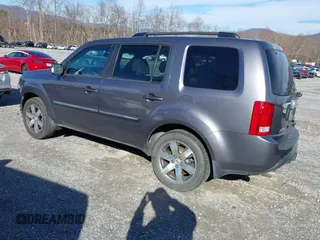 2014 Honda Pilot Touring with VIN 5FNYF4H95EB019048, listed as a IAAI auction lot 41526958 with 172,252 mi miles and . Bid and sale history available at DreamBid. Image 3.