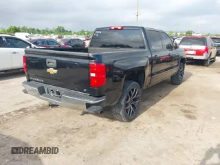 2015 Chevrolet Silverado 1500 LT with VIN 3GCPCREC3FG477250, listed as a IAAI auction lot 42150823 with 169,036 mi miles and . Bid and sale history available at DreamBid. Image 4.
