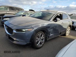 2021 Mazda CX-30 Premium with VIN 3MVDMBDM2MM220739, listed as a Copart auction lot 86848764 with 48,522 mi miles and Salvage title. Bid and sale history available at DreamBid. Image 1.