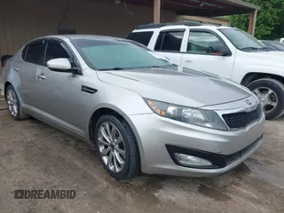 2013 Kia Optima LX with VIN 5XXGM4A70DG129754, listed as a IAAI auction lot 42061666 with 225,099 mi miles. Bid and sale history available at carsss.com. Image 1.