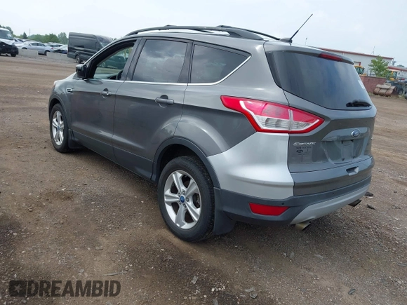 2014 Ford Escape SE with VIN 1FMCU9GX4EUA83808, listed as a IAAI auction lot 42576737 with 116,074 mi miles and . Bid and sale history available at DreamBid. Image 3.