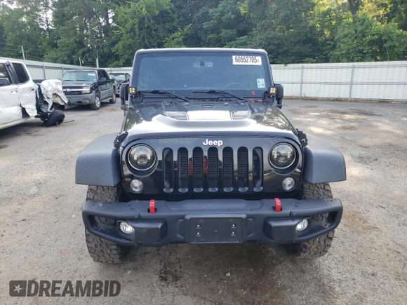 2016 Jeep Wrangler Unlimited Rubicon with VIN 1C4HJWFG9GL220687, listed as a Copart auction lot 60552705 with 49,525 mi miles and Salvage title. Bid and sale history available at DreamBid. Image 5.