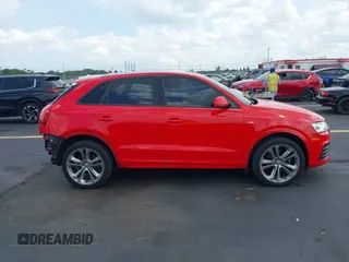 2018 Audi Q3 Premium z VIN WA1BCCFS1JR005466, wystawiony jako IAAI lot #42326910 z przebiegiem 78 497 mil mil oraz . Historia ofert i sprzedaży dostępna na DreamBid. Obrazek 13.