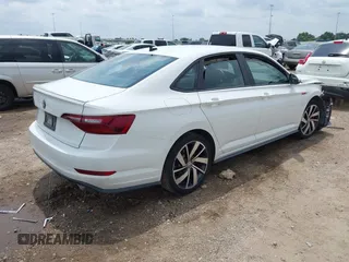 2021 Volkswagen Jetta S z VIN 3VW6T7BU2MM061165, wystawiony jako IAAI lot #42423828 z przebiegiem 41 603 mil mil oraz . Historia ofert i sprzedaży dostępna na DreamBid. Obrazek 4.