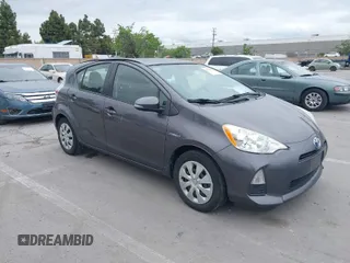 2014 Toyota Prius One with VIN JTDKDTB37E1564963, listed as a IAAI auction lot 42054591 with 186,680 mi miles and . Bid and sale history available at DreamBid. Image 1.