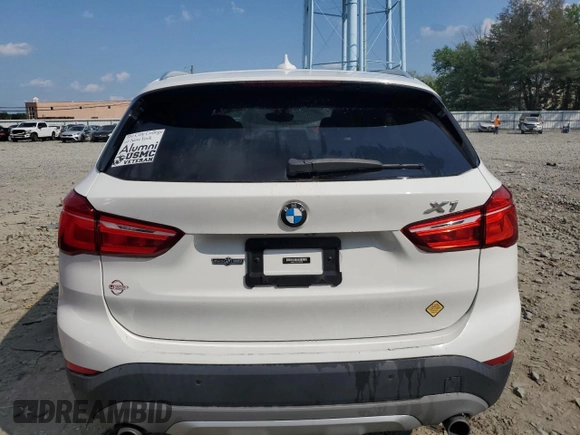 2017 BMW X1 xDrive28i z VIN WBXHT3C35H5F86099, wystawiony jako Copart lot #60196275 z przebiegiem 61 117 mil mil oraz Szkoda całkowita • Salvage title. Historia ofert i sprzedaży dostępna na DreamBid. Obrazek 6.