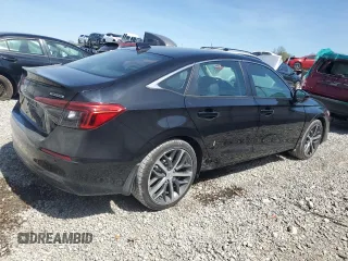 2023 Honda Civic Sedan Touring with VIN 2HGFE1F98PH323825, listed as a Copart auction lot 54216025 with 1,616 mi miles and Salvage Title. Bid and sale history available at carsss.com. Image 3.
