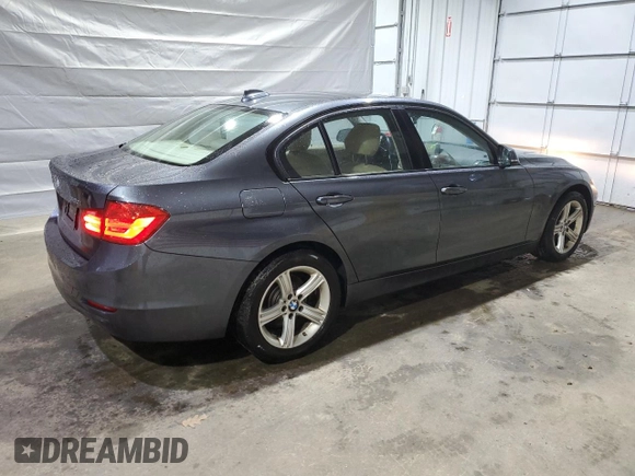 2015 BMW 3 Series 320i xDrive with VIN WBA3C3C52FP664472, listed as a Copart auction lot 55647585 with 129,934 mi miles and Salvage title. Bid and sale history available at DreamBid. Image 3.