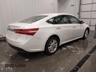 2014 Toyota Avalon Limited with VIN 4T1BK1EB1EU088538, listed as a IAAI auction lot 41793990 with 75,244 mi miles. Bid and sale history available at carsss.com. Image 4.