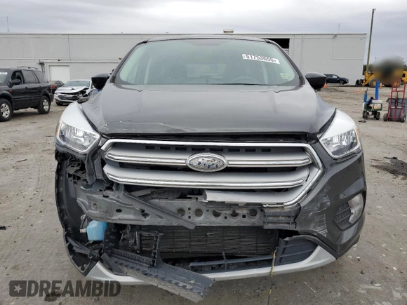 2017 Ford Escape SE with VIN 1FMCU9GD7HUA10460, listed as a Copart auction lot 51753655 with 109,494 mi miles and Salvage Title. Bid and sale history available at DreamBid. Image 5.