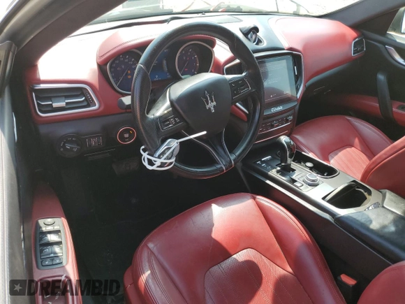 2018 Maserati Ghibli с VIN ZAM57XSA3J1296624, выставлен на аукционе Copart как лот 60810835 с пробегом 62 582 миль миль и Чистый • Clean title. История ставок и продаж доступна на DreamBid. Изображение 8.