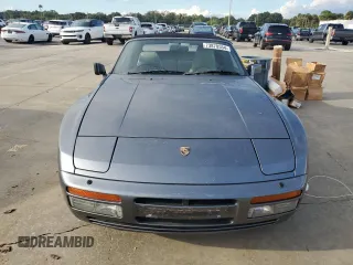 1991 Porsche 944 z VIN WP0ZZZ94ZLN431804, wystawiony jako Copart lot #73870554 z przebiegiem 131 475 mil mil oraz Szkoda całkowita • Salvage title. Historia ofert i sprzedaży dostępna na DreamBid. Obrazek 5.