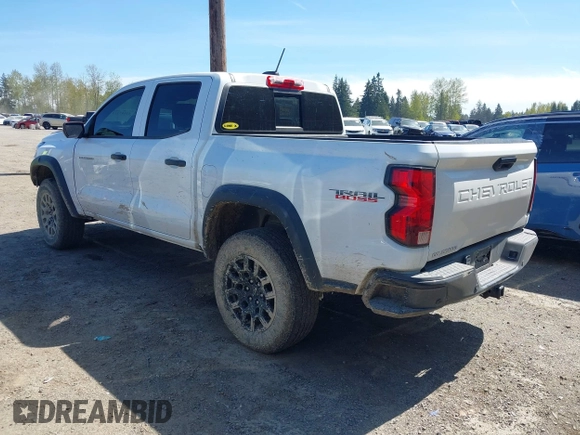 2023 Chevrolet Colorado 4WD Trail Boss with VIN 1GCPTEEK2P1203392, listed as a IAAI auction lot 42043211 with 27,589 mi miles. Bid and sale history available at carsss.com. Image 3.